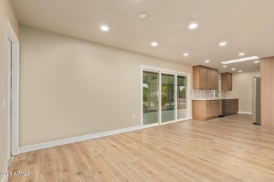 This stunning Sun City residence has been fully remodeled and is on Sun City Lakes West and East in Arizona - for sale on GolfHomes.com, golf home, golf lot