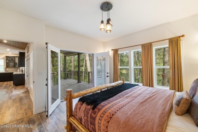 Discover lakefront living at its finest on Lake San Souci! This on Stoneridge Golf Club in Idaho - for sale on GolfHomes.com, golf home, golf lot