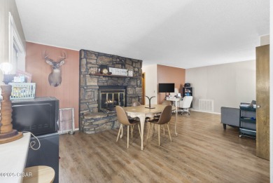 This 3-bedroom, 2-bath home has 1,676 sq. ft. of living space on Bella Vista Country Club and Golf Course in Arkansas - for sale on GolfHomes.com, golf home, golf lot