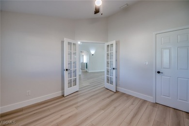 Located in the heart of The Forest, this well-maintained on The Forest Country Club in Florida - for sale on GolfHomes.com, golf home, golf lot