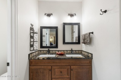 Discover lakefront living at its finest on Lake San Souci! This on Stoneridge Golf Club in Idaho - for sale on GolfHomes.com, golf home, golf lot