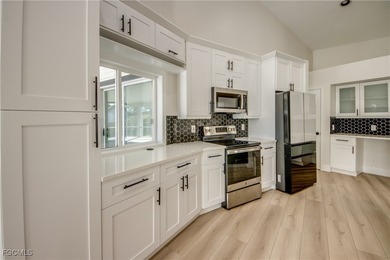 Located in the heart of The Forest, this well-maintained on The Forest Country Club in Florida - for sale on GolfHomes.com, golf home, golf lot