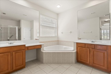 Welcome to this spacious 4-bedroom, 4-bathroom home with a bonus on Heathrow Country Club in Florida - for sale on GolfHomes.com, golf home, golf lot