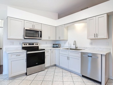 This is your opportunity to own a newly resurfaced pool home on Daytona Beach Golf Club in Florida - for sale on GolfHomes.com, golf home, golf lot