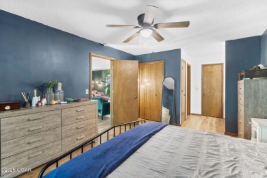 This 3-bedroom, 2-bath home has 1,676 sq. ft. of living space on Bella Vista Country Club and Golf Course in Arkansas - for sale on GolfHomes.com, golf home, golf lot