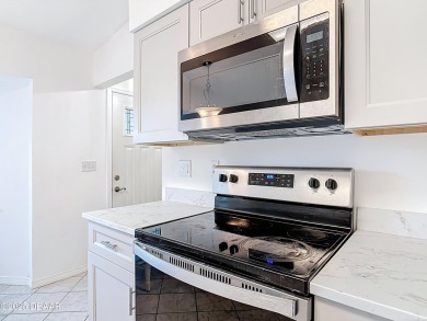 This is your opportunity to own a newly resurfaced pool home on Daytona Beach Golf Club in Florida - for sale on GolfHomes.com, golf home, golf lot