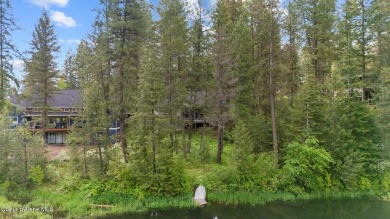 Discover lakefront living at its finest on Lake San Souci! This on Stoneridge Golf Club in Idaho - for sale on GolfHomes.com, golf home, golf lot