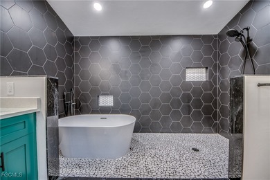 Located in the heart of The Forest, this well-maintained on The Forest Country Club in Florida - for sale on GolfHomes.com, golf home, golf lot