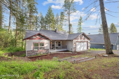 Discover lakefront living at its finest on Lake San Souci! This on Stoneridge Golf Club in Idaho - for sale on GolfHomes.com, golf home, golf lot