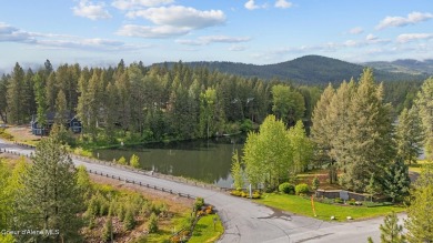 Discover lakefront living at its finest on Lake San Souci! This on Stoneridge Golf Club in Idaho - for sale on GolfHomes.com, golf home, golf lot