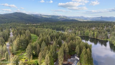 Discover lakefront living at its finest on Lake San Souci! This on Stoneridge Golf Club in Idaho - for sale on GolfHomes.com, golf home, golf lot