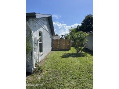 This is your opportunity to own a newly resurfaced pool home on Daytona Beach Golf Club in Florida - for sale on GolfHomes.com, golf home, golf lot
