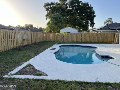 This is your opportunity to own a newly resurfaced pool home on Daytona Beach Golf Club in Florida - for sale on GolfHomes.com, golf home, golf lot