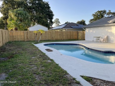 This is your opportunity to own a newly resurfaced pool home on Daytona Beach Golf Club in Florida - for sale on GolfHomes.com, golf home, golf lot