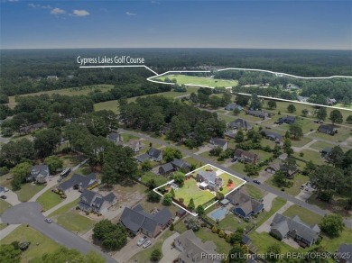 Indoor - Outdoor, this home has everything a homeowner could on Cypress Lakes Golf Course in North Carolina - for sale on GolfHomes.com, golf home, golf lot