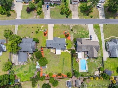 Indoor - Outdoor, this home has everything a homeowner could on Cypress Lakes Golf Course in North Carolina - for sale on GolfHomes.com, golf home, golf lot