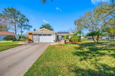 This well-maintained and tastefully updated 2-bedroom on Highland Lakes Executive Golf Course in Florida - for sale on GolfHomes.com, golf home, golf lot