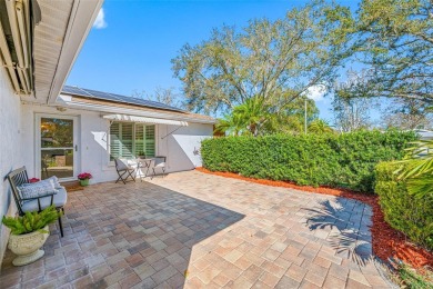 This well-maintained and tastefully updated 2-bedroom on Highland Lakes Executive Golf Course in Florida - for sale on GolfHomes.com, golf home, golf lot