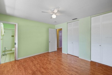 Savor the Florida lifestyle in this charming three-bedroom pool on Daytona Beach Golf Club in Florida - for sale on GolfHomes.com, golf home, golf lot