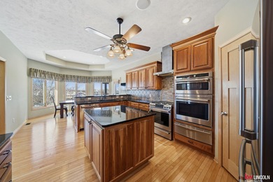 Come tour this amazing home on NuMark Golf Course. This on Pine Lake Golf and Tennis Club in Nebraska - for sale on GolfHomes.com, golf home, golf lot