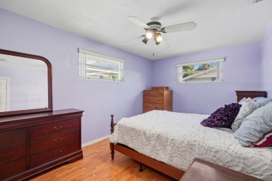 Savor the Florida lifestyle in this charming three-bedroom pool on Daytona Beach Golf Club in Florida - for sale on GolfHomes.com, golf home, golf lot