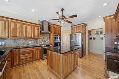 Come tour this amazing home on NuMark Golf Course. This on Pine Lake Golf and Tennis Club in Nebraska - for sale on GolfHomes.com, golf home, golf lot