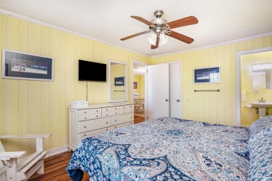 Welcome to your dream getaway! This stunning 6-bedroom on Beachwood Golf Club in South Carolina - for sale on GolfHomes.com, golf home, golf lot