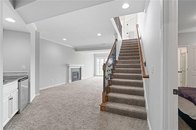 Rare END UNIT in maintenance-provided Staley Farms overlooking on Staley Farms Golf Club in Missouri - for sale on GolfHomes.com, golf home, golf lot