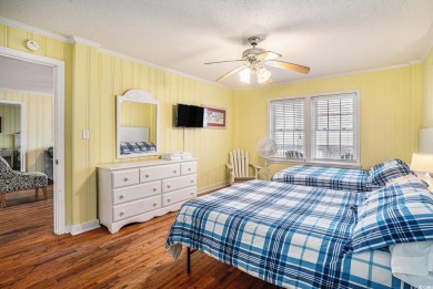 Welcome to your dream getaway! This stunning 6-bedroom on Beachwood Golf Club in South Carolina - for sale on GolfHomes.com, golf home, golf lot