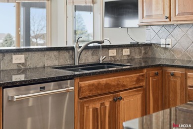 Come tour this amazing home on NuMark Golf Course. This on Pine Lake Golf and Tennis Club in Nebraska - for sale on GolfHomes.com, golf home, golf lot