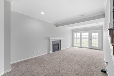 Rare END UNIT in maintenance-provided Staley Farms overlooking on Staley Farms Golf Club in Missouri - for sale on GolfHomes.com, golf home, golf lot