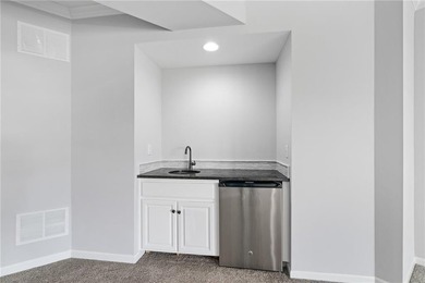 Rare END UNIT in maintenance-provided Staley Farms overlooking on Staley Farms Golf Club in Missouri - for sale on GolfHomes.com, golf home, golf lot