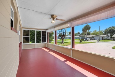 Savor the Florida lifestyle in this charming three-bedroom pool on Daytona Beach Golf Club in Florida - for sale on GolfHomes.com, golf home, golf lot