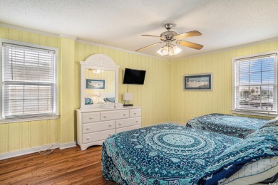 Welcome to your dream getaway! This stunning 6-bedroom on Beachwood Golf Club in South Carolina - for sale on GolfHomes.com, golf home, golf lot