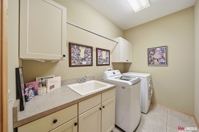 Come tour this amazing home on NuMark Golf Course. This on Pine Lake Golf and Tennis Club in Nebraska - for sale on GolfHomes.com, golf home, golf lot