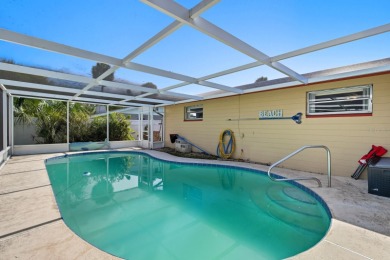 Savor the Florida lifestyle in this charming three-bedroom pool on Daytona Beach Golf Club in Florida - for sale on GolfHomes.com, golf home, golf lot