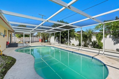 Savor the Florida lifestyle in this charming three-bedroom pool on Daytona Beach Golf Club in Florida - for sale on GolfHomes.com, golf home, golf lot