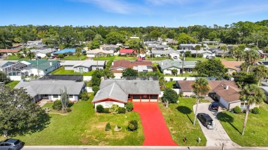 Savor the Florida lifestyle in this charming three-bedroom pool on Daytona Beach Golf Club in Florida - for sale on GolfHomes.com, golf home, golf lot