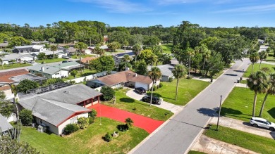 Savor the Florida lifestyle in this charming three-bedroom pool on Daytona Beach Golf Club in Florida - for sale on GolfHomes.com, golf home, golf lot