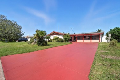 Savor the Florida lifestyle in this charming three-bedroom pool on Daytona Beach Golf Club in Florida - for sale on GolfHomes.com, golf home, golf lot