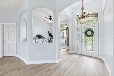 Exquisite Golf Course Living at 13049 Thoroughbred Drive, Dade on Lake Jovita Golf and Country Club in Florida - for sale on GolfHomes.com, golf home, golf lot