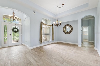 Exquisite Golf Course Living at 13049 Thoroughbred Drive, Dade on Lake Jovita Golf and Country Club in Florida - for sale on GolfHomes.com, golf home, golf lot