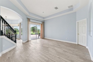 Exquisite Golf Course Living at 13049 Thoroughbred Drive, Dade on Lake Jovita Golf and Country Club in Florida - for sale on GolfHomes.com, golf home, golf lot