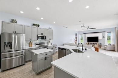 Exquisite Golf Course Living at 13049 Thoroughbred Drive, Dade on Lake Jovita Golf and Country Club in Florida - for sale on GolfHomes.com, golf home, golf lot