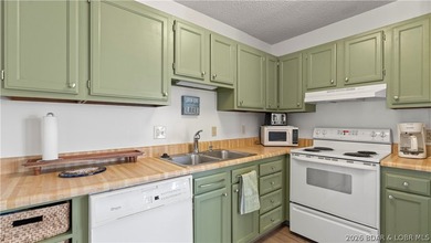 Experience the best of Lake of the Ozarks in this spacious on Seasons Ridge At Four Seasons in Missouri - for sale on GolfHomes.com, golf home, golf lot