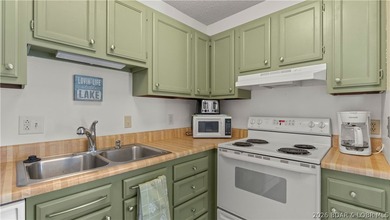 Experience the best of Lake of the Ozarks in this spacious on Seasons Ridge At Four Seasons in Missouri - for sale on GolfHomes.com, golf home, golf lot