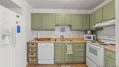 Experience the best of Lake of the Ozarks in this spacious on Seasons Ridge At Four Seasons in Missouri - for sale on GolfHomes.com, golf home, golf lot