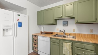 Experience the best of Lake of the Ozarks in this spacious on Seasons Ridge At Four Seasons in Missouri - for sale on GolfHomes.com, golf home, golf lot