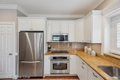 Welcome to a stunning, move-in-ready luxury condo nestled in an on Prestwick Village Golf Club in Michigan - for sale on GolfHomes.com, golf home, golf lot