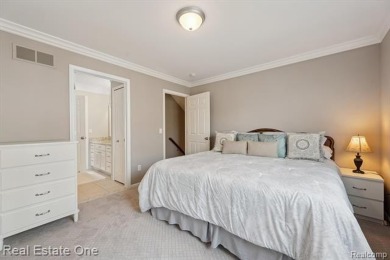Welcome to a stunning, move-in-ready luxury condo nestled in an on Prestwick Village Golf Club in Michigan - for sale on GolfHomes.com, golf home, golf lot